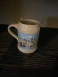 caneca com bonecos