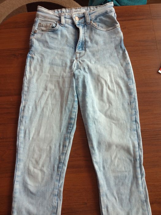 Jeansy damskie Reserved