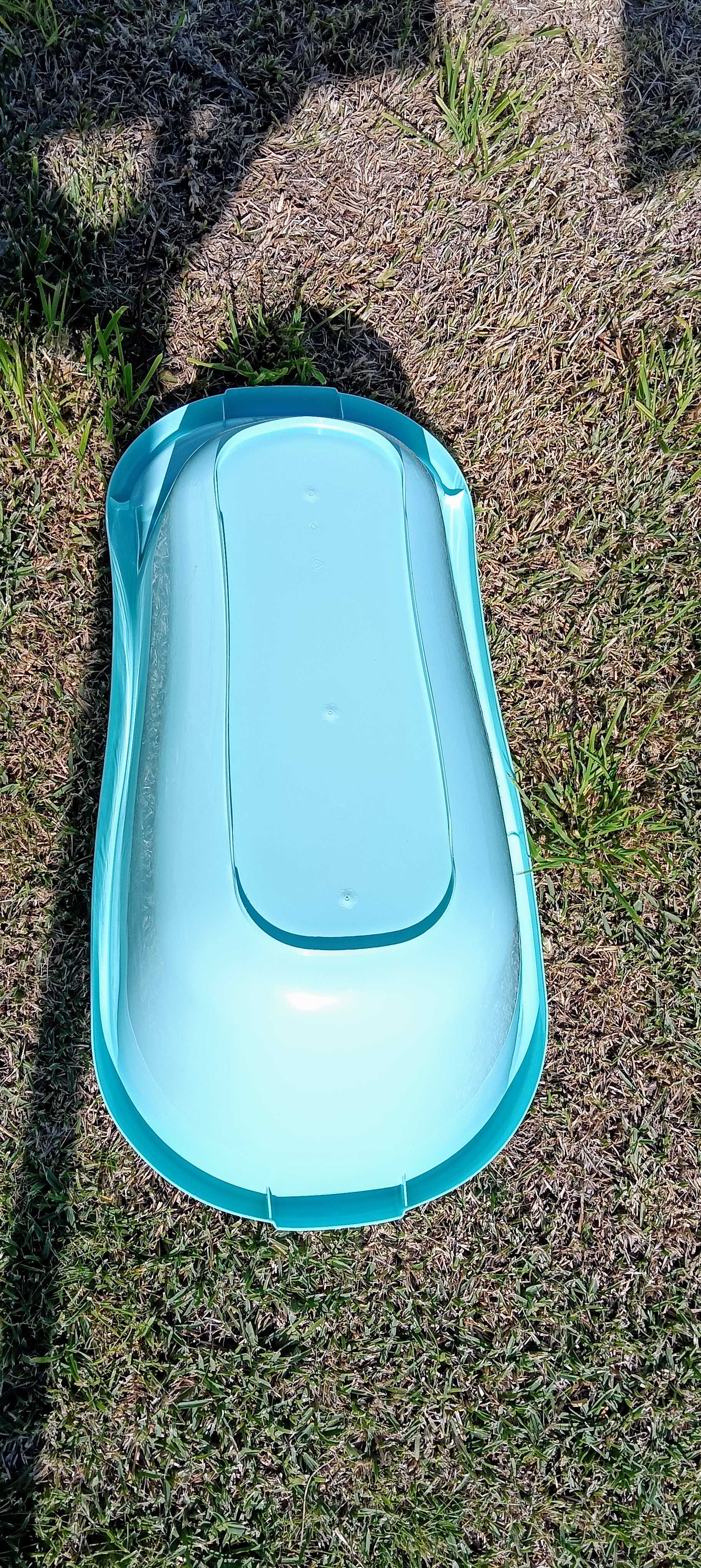 Cadeirinha de mesa e banheira como novo.