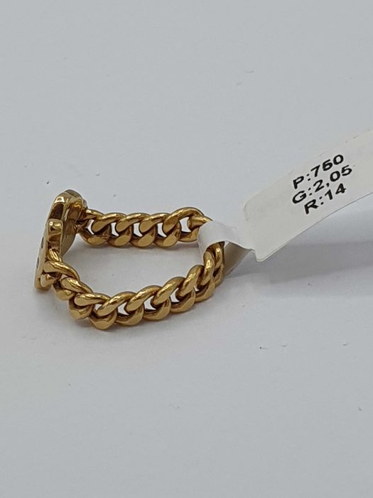 Złoty pierścionek Tous z diamentem P: 750/ G: 2,05/ CT: 0,02