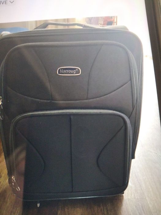 Продам новый чемодан