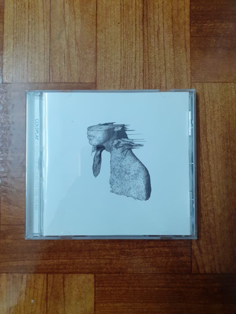 Coldplay, a rush of...