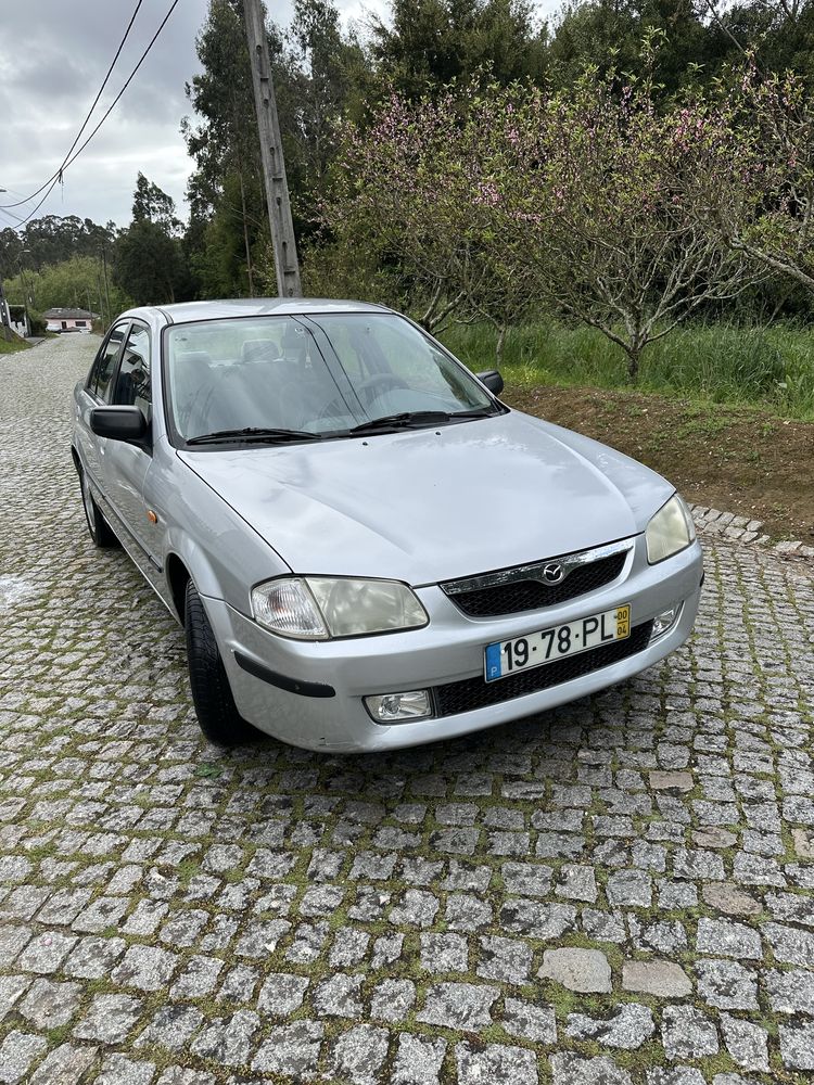 Mazda 323 125mil km