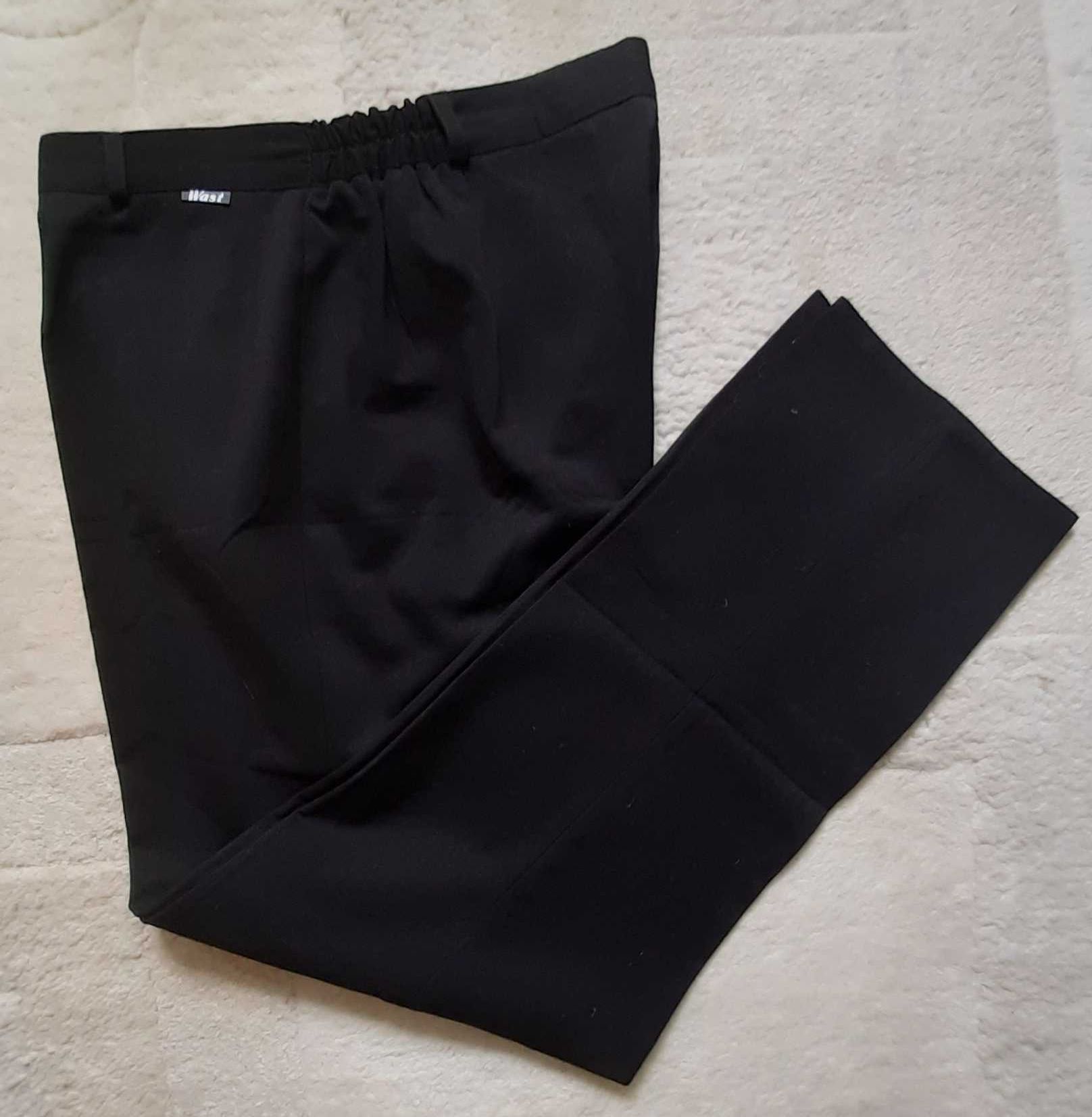 Damskie polskie czarne spodnie Wast, rozmiar 48