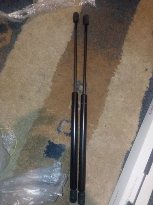 Амортизаторы капота багажника VW