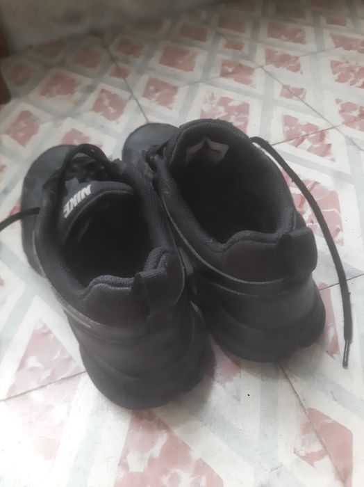 Tenis Nike T Lite XI