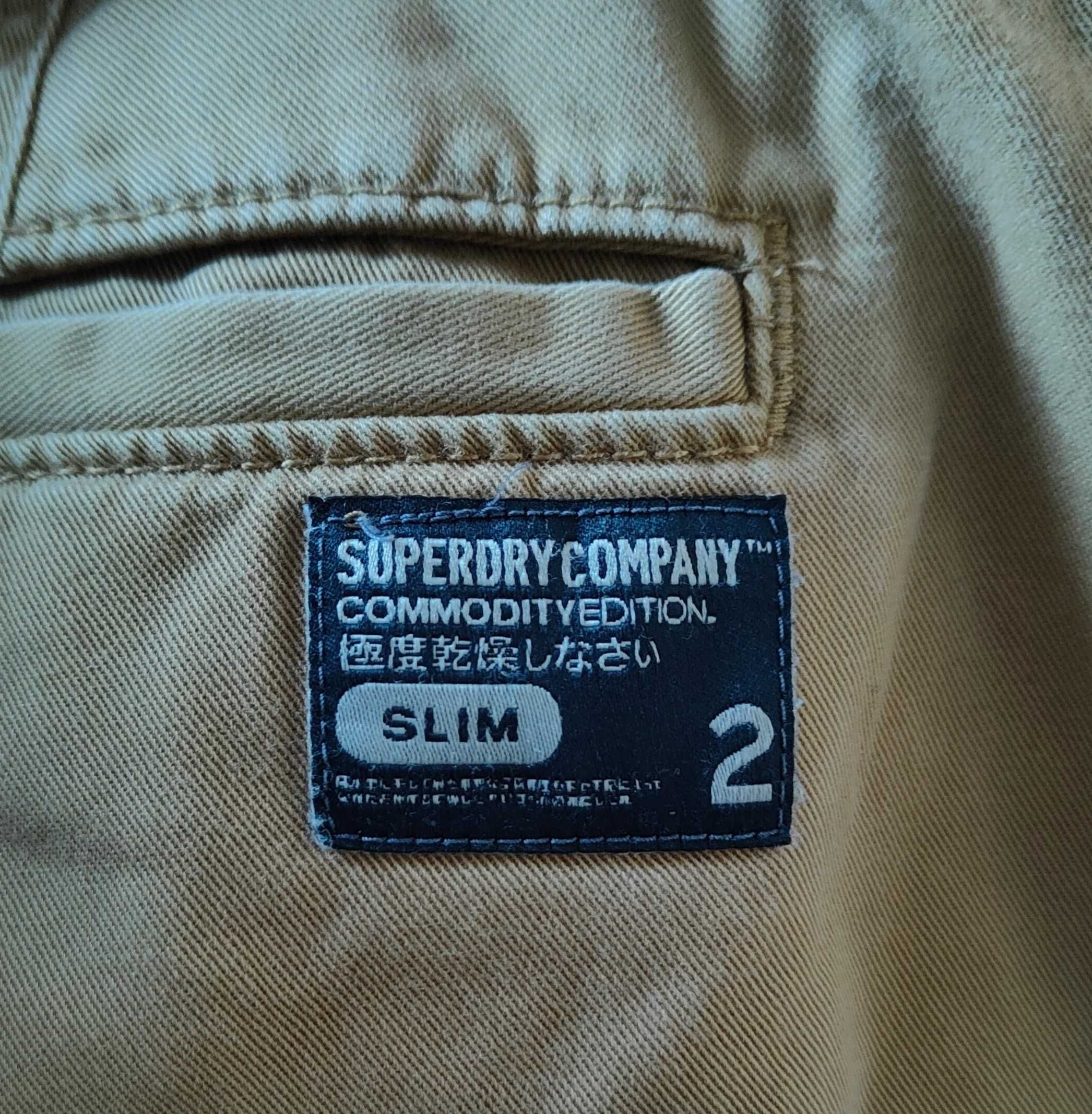 Wr) SUPERDRY męskie spodnie materiałowe Roz.M