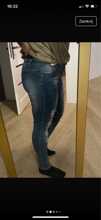 Spodnie jeansowe gumowane z dziurami rozmiar XL