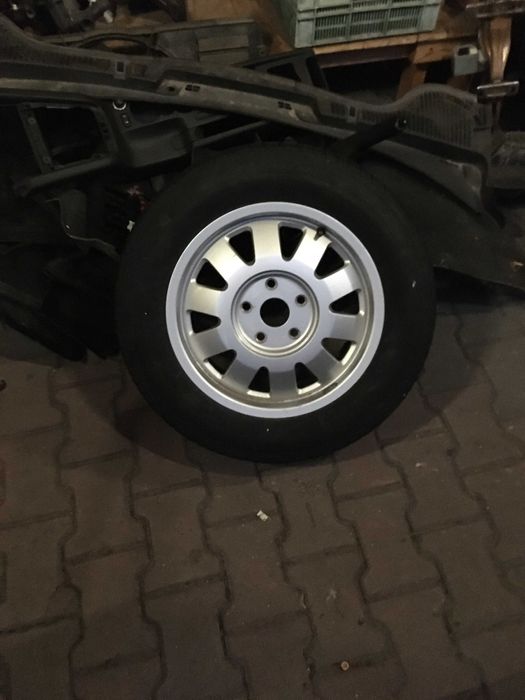 FELGA Aluminiowa AUDI 195/65 R15 nowa Plus opona stan bdb Firestone