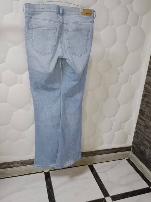 Джинси кльош блакитні