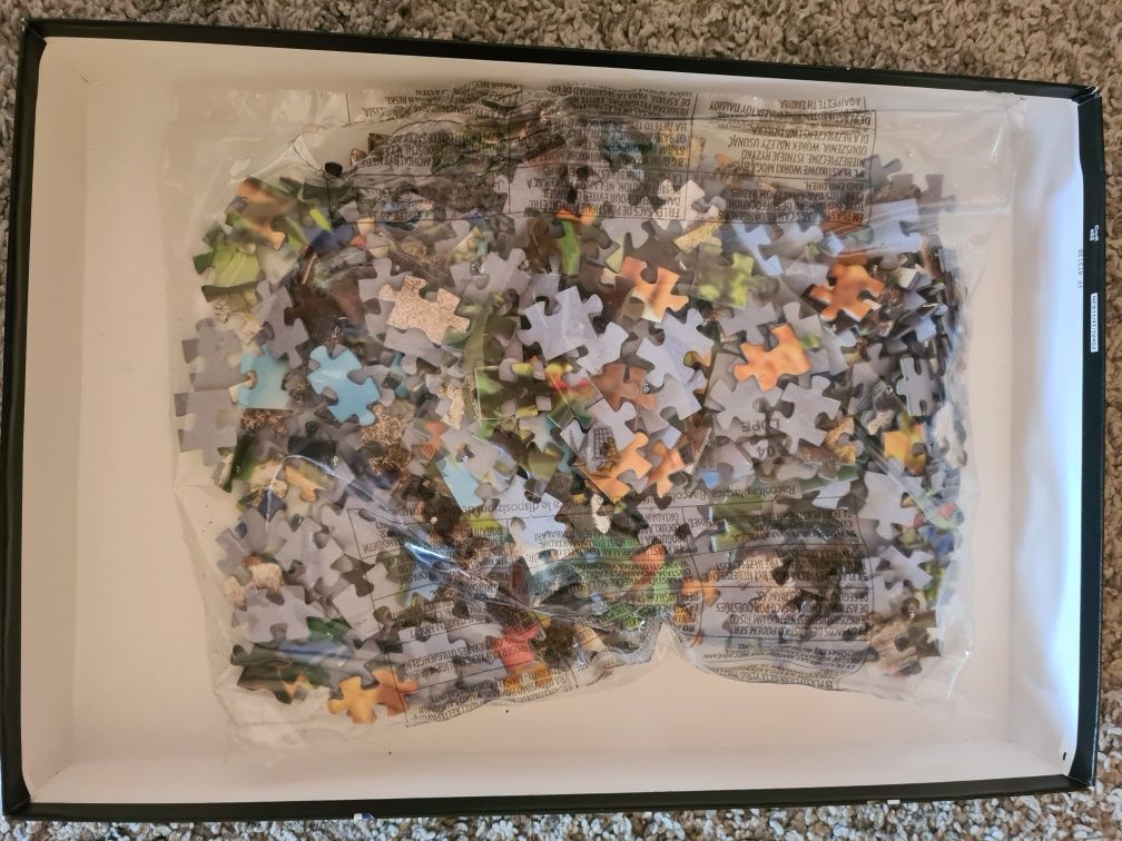 4  puzzles de 500, 1000 e 1500 peças