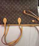 Mala LouisVuitton com pequeno defeito