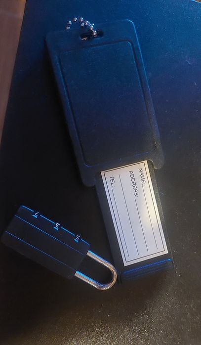 Porta chave para pôr o nome e aluquete de segurança