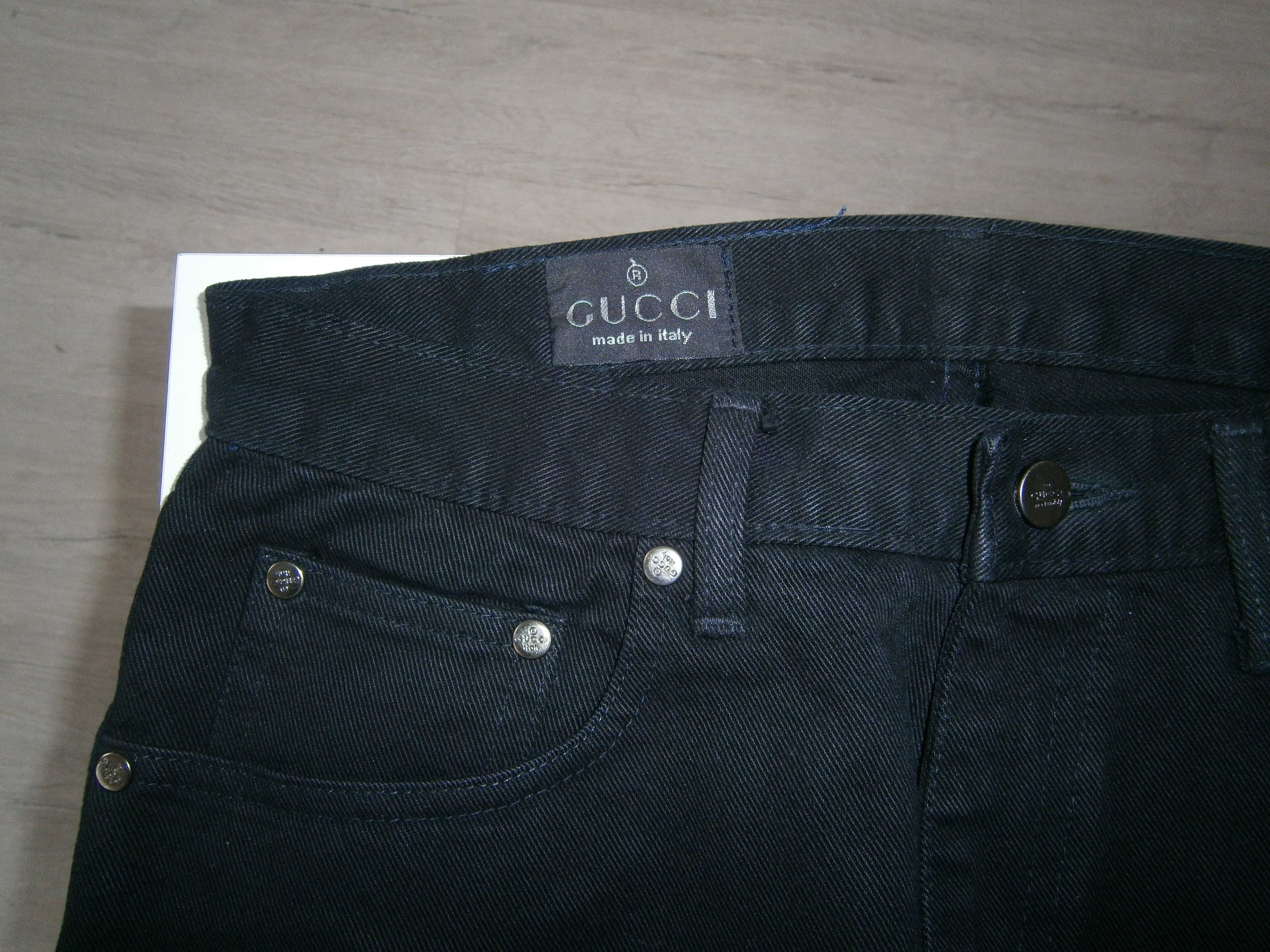 Женские джинсы-брюки фирмы Gucci