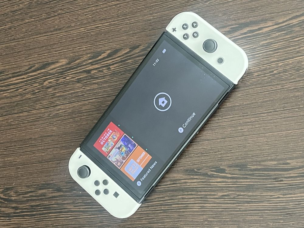 Nintendo Switch OLED + pad 8bitdo + Zelda BOTW