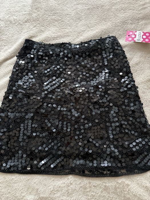Спідниця міні в паєтку нова