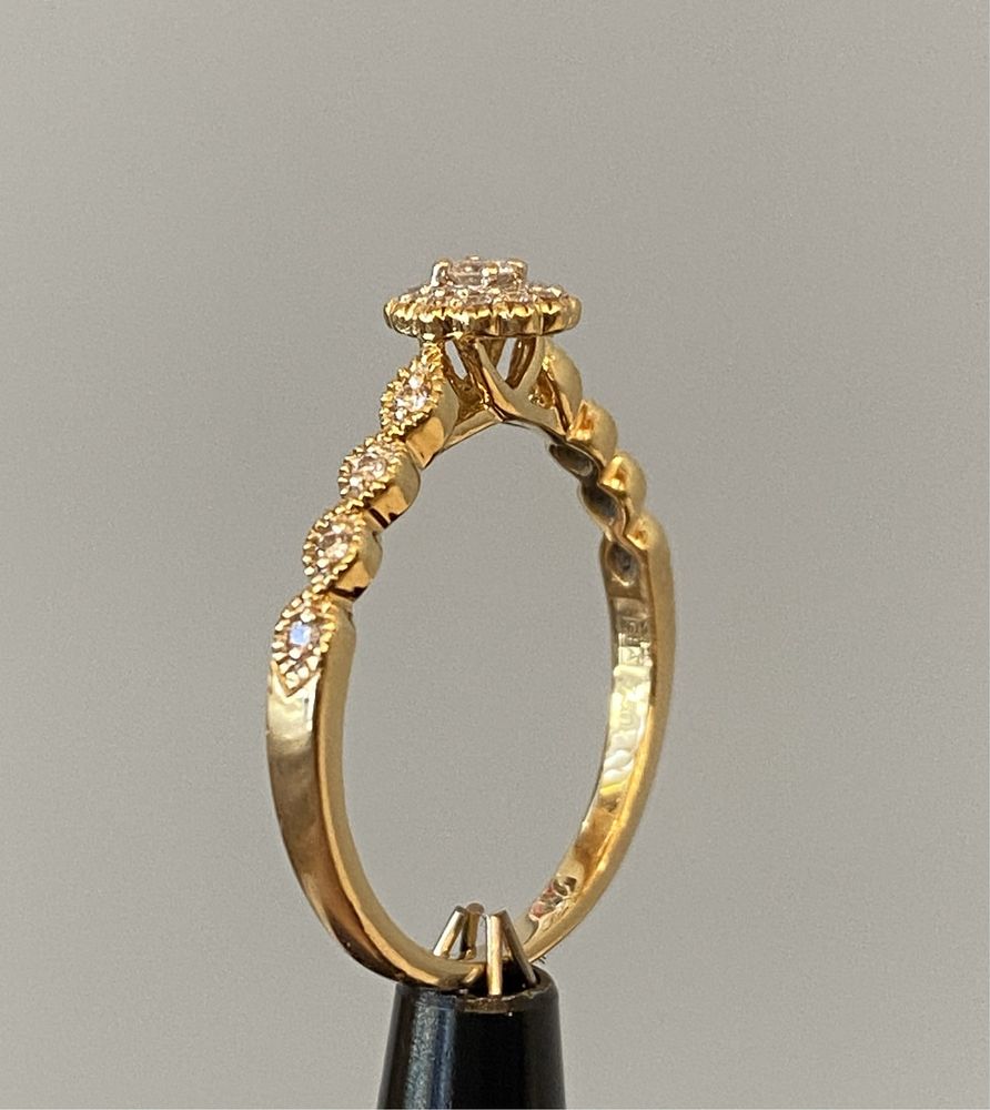 Piękny pierścionek złoty z diamentami próba 750