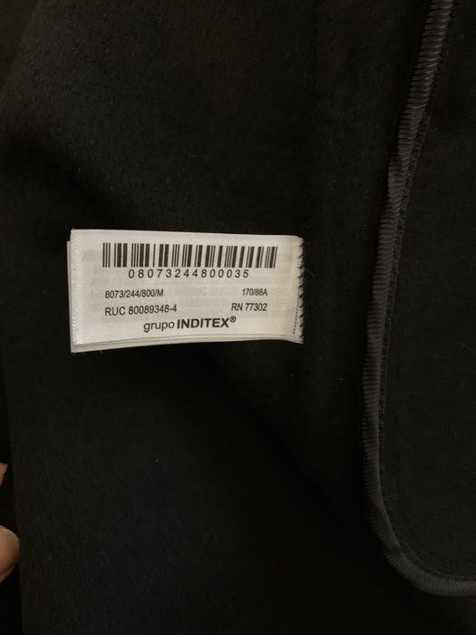 Чорне двобортне довге пальто з вовною вільного прямого крою від zara