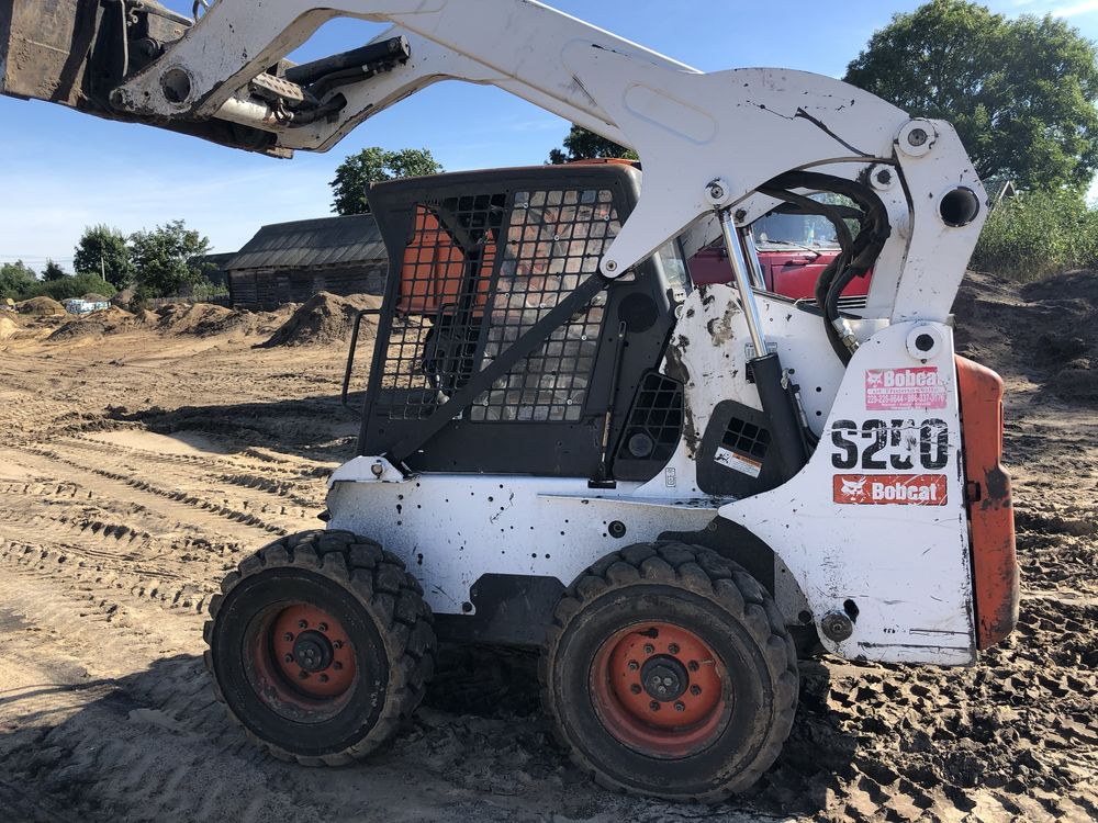 Bobcat s250 бобкет jcb. Міні навантажувач
