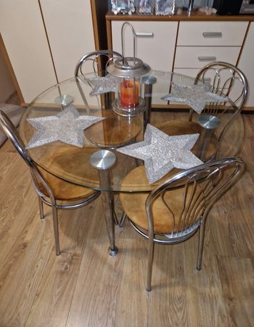 Okrągły, szklany stół z 4 tapicerowanymi  krzesłami