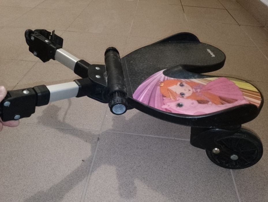 Dostawką do wózka BumpRider