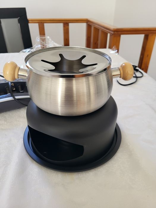 Fondue a lamparina nunca usado