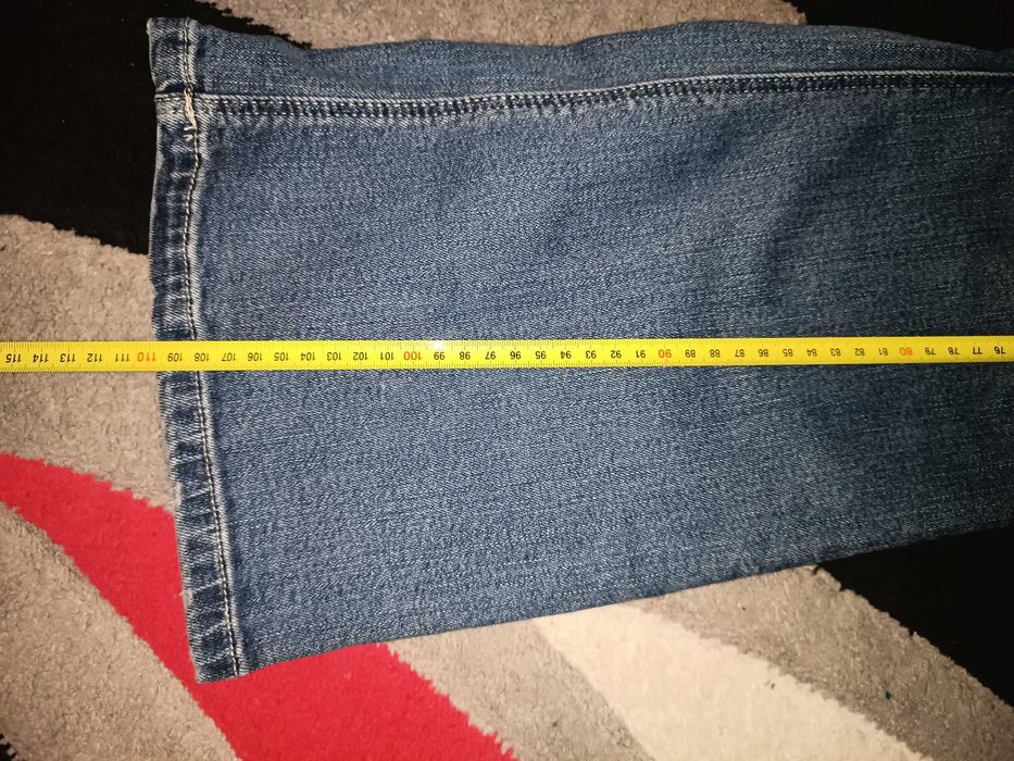 Nowe jeansy dzwony mid waist 42