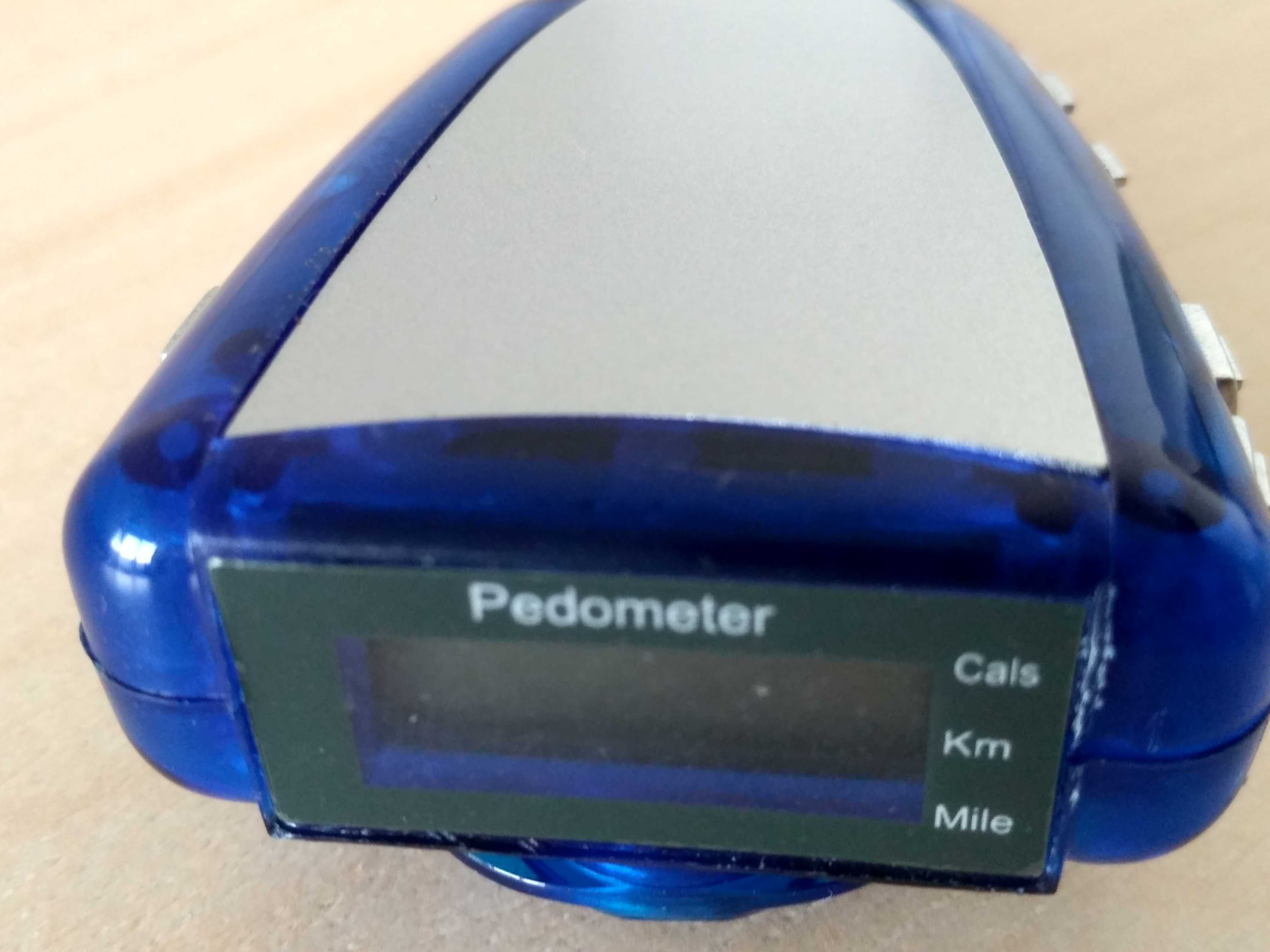 Pedometer with FM scan radio