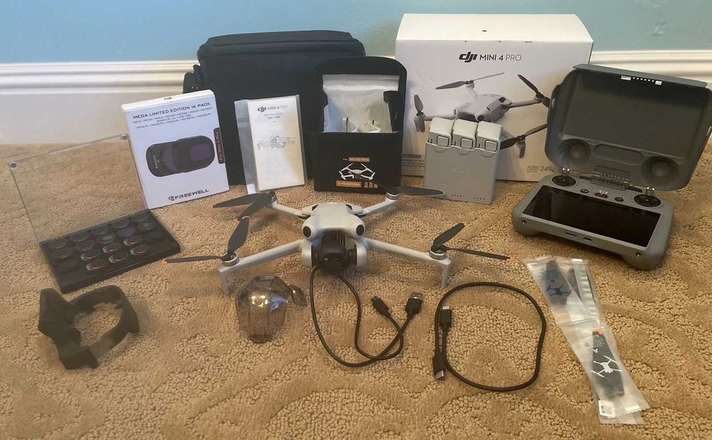 Dron DJI Mini 4 Pro Fly More Combo 16 filtrów NDF + RC2 + Torba