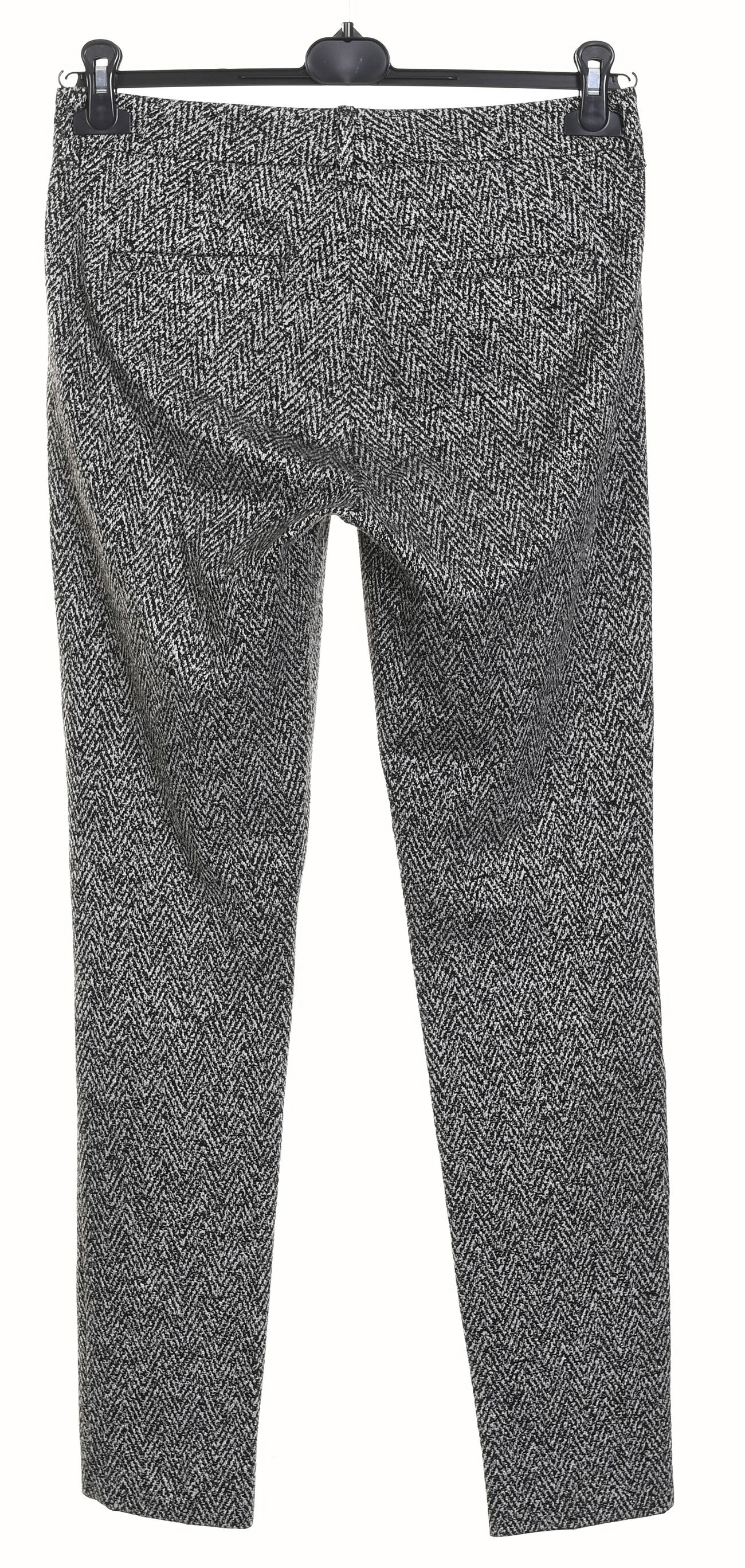 ZERRES czarno-białe spodnie damskie z dżerseju legginsy r. 38