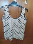 Blusa  marca miss miss . Beje e preta