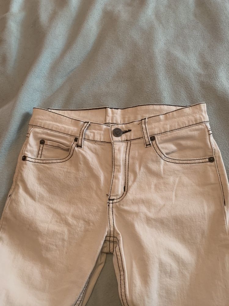 Białe spodnie rurki cheap monday 27/34 damskie ubrania rurki opener