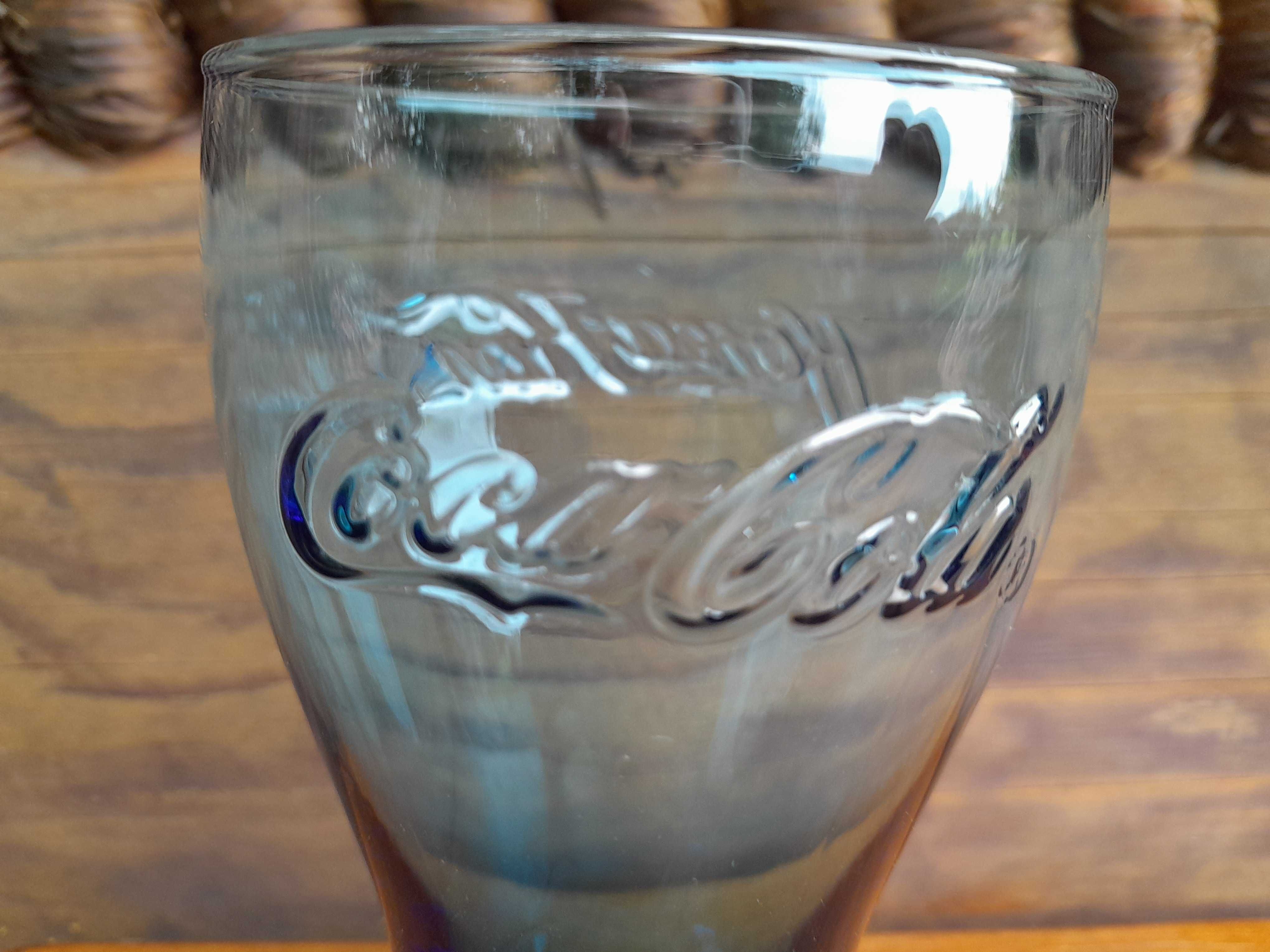 Stara używana niebieska kolekcjonerska szklanka Coca Cola