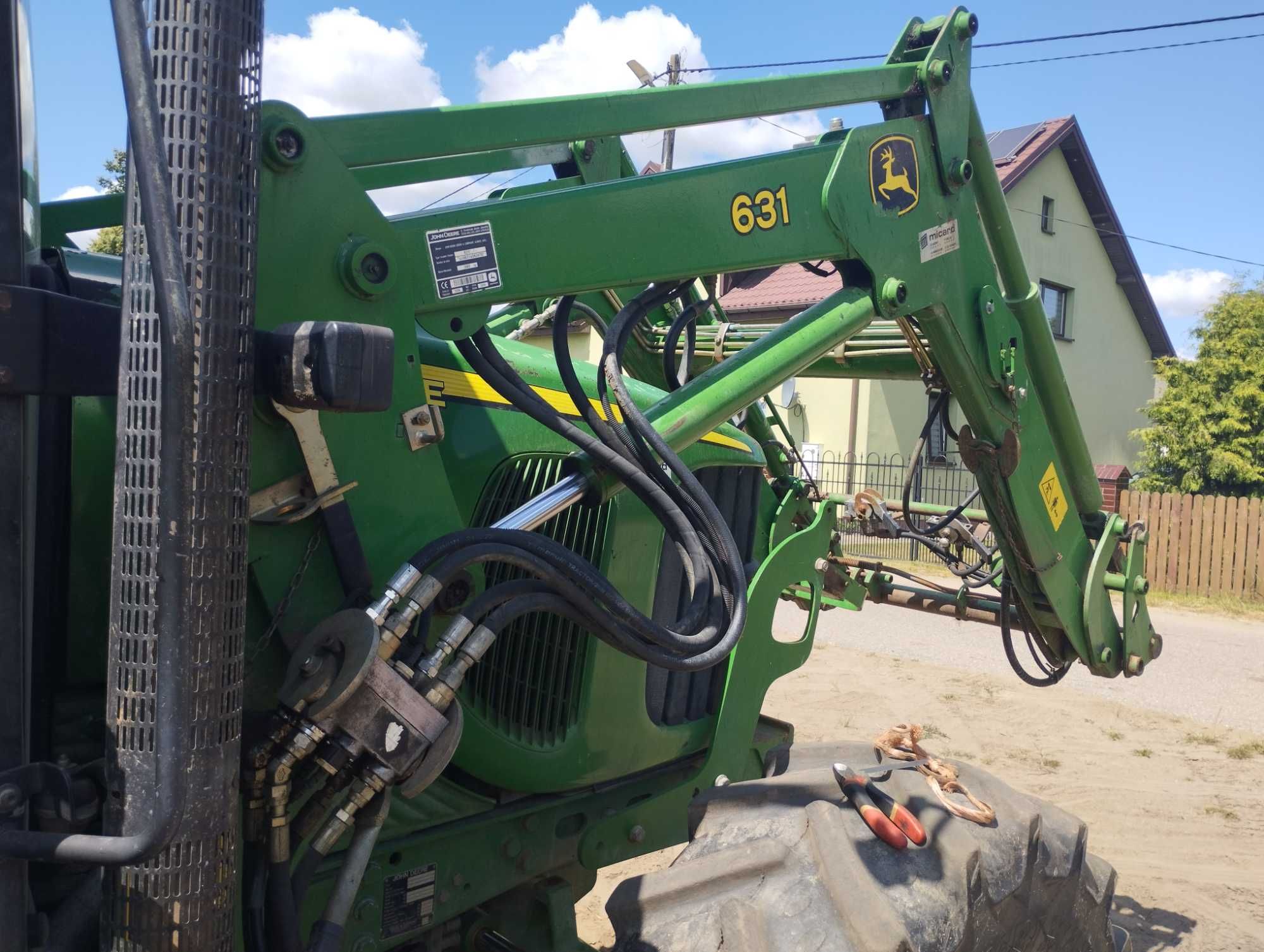 Ładowacz czołowy John Deere 631 , tur