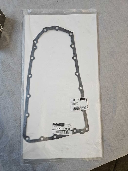 Оригінальний фільтр+прокладка піддону Nissan(31728-1XF03, 31397-1XF0C)