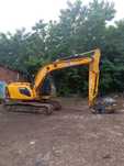 Koparka gąsienicowa JCB JS 145 i głowica ścinkowa TMK 400