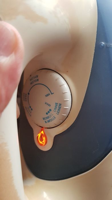 Праска , утюг Philips.