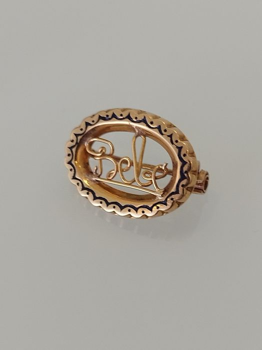 Pregadeira em ouro de 19,2kt