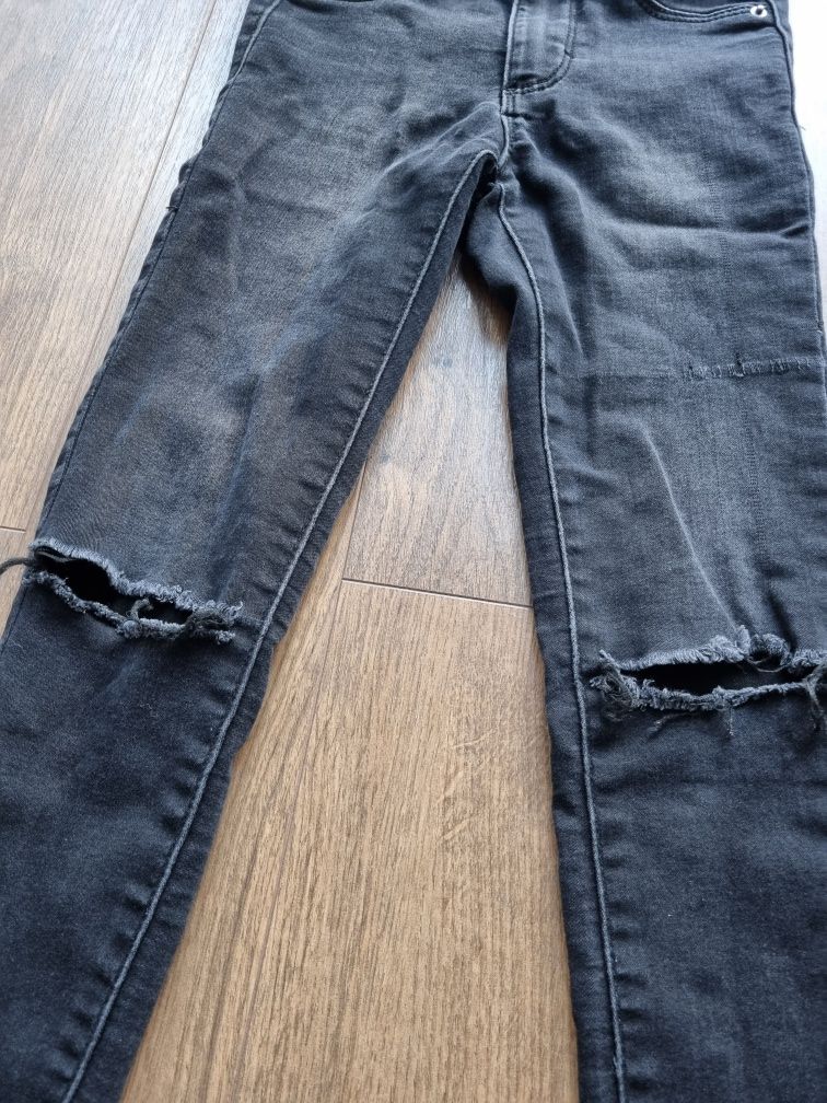 Reserved spodnie z dziurami slim jeansy rurki
