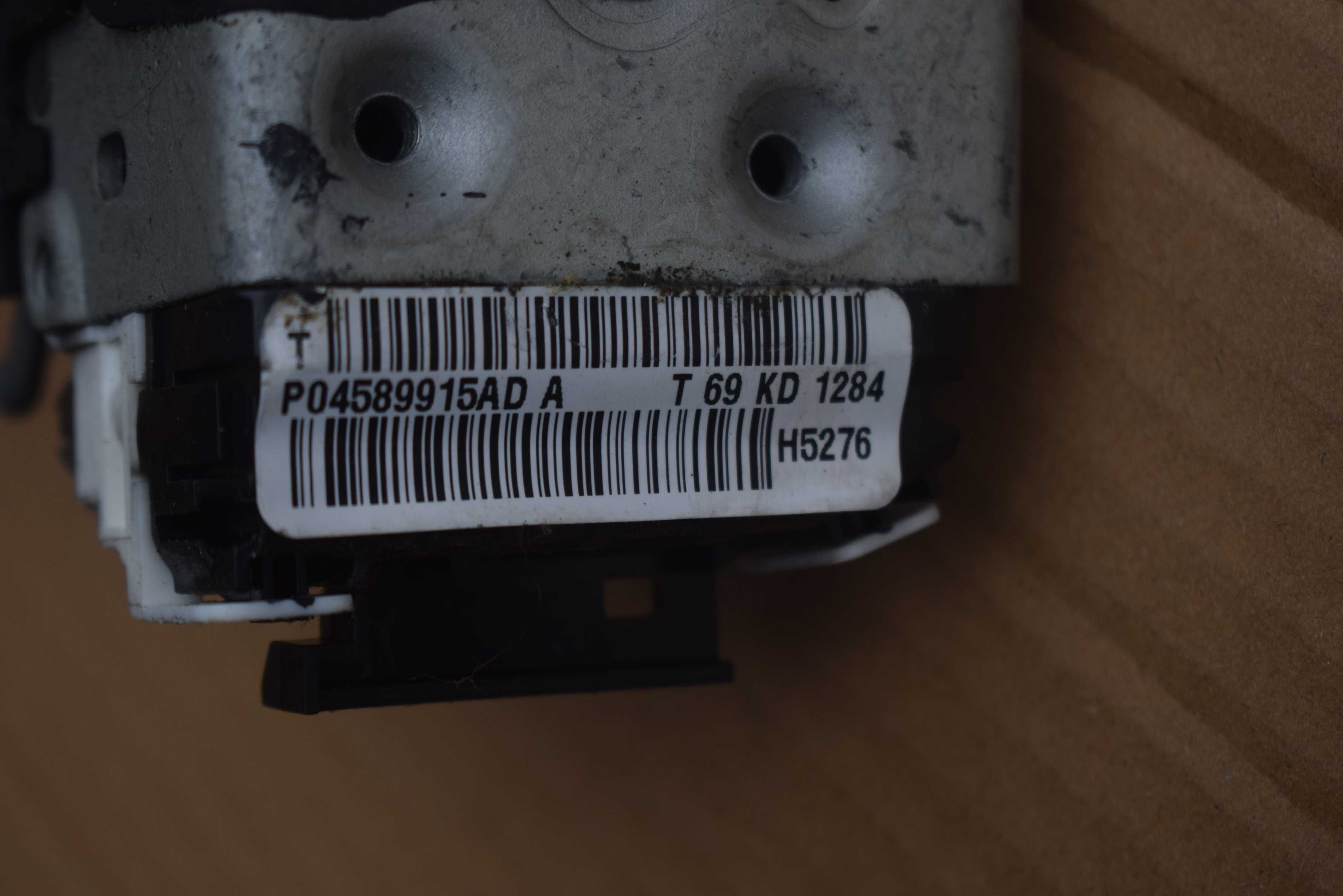 zamek drzwi lewy tył tylny FIAT FREEMONT 11R. P0458.9915AD