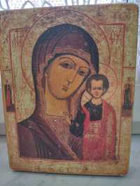 Ikona na drewnie z wizerunkiem Matki Boskiej z Dzieciątkiem Jezus.