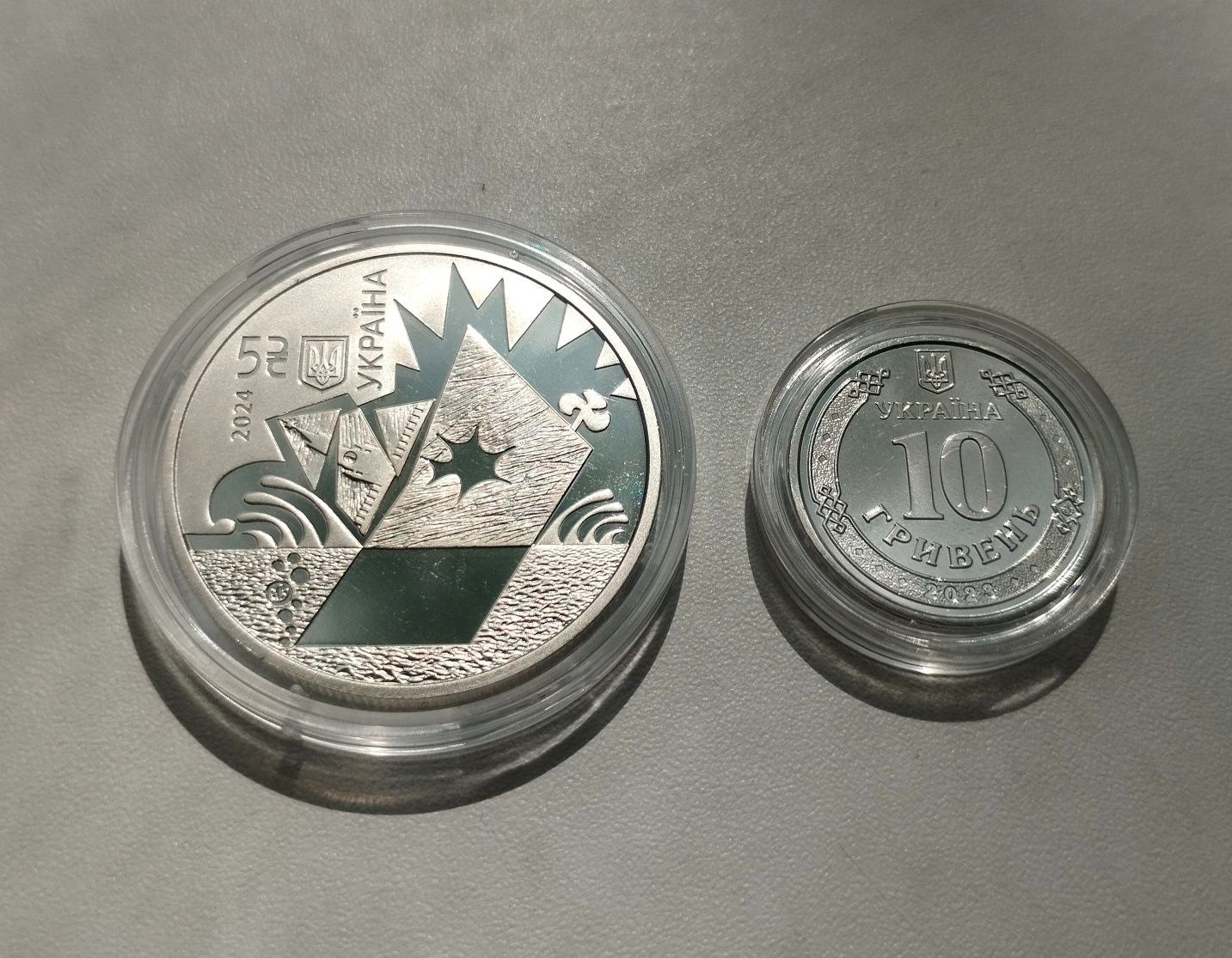 Дві монети НБУ Нептун і ППО Patriot