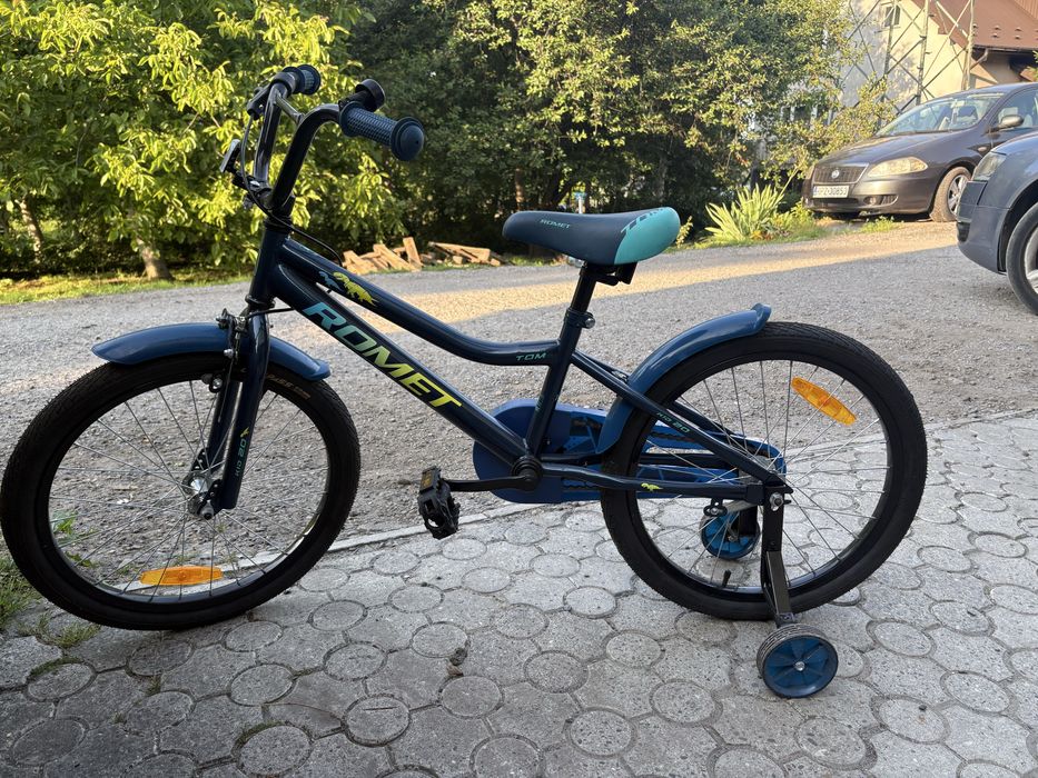 Rower romet z bocznymi kółkami