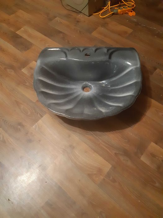 Продам Умывальник в форме ракушки.