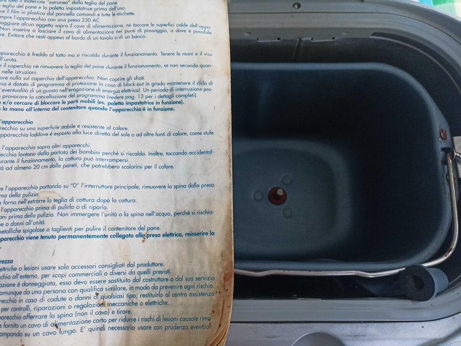 Хлебопечка Delonghi