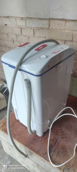 новая пластиковая стиральная машина как старая круглая Советская