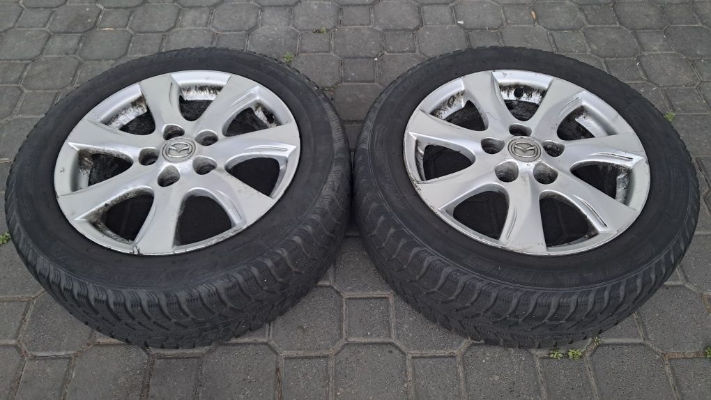 4 używane alufelgi 16" Mazda (i inne) z oponami zimowymi Continental 2