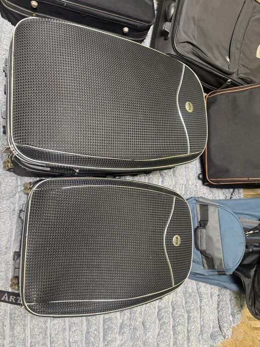 Чемодани, дорожні сумки