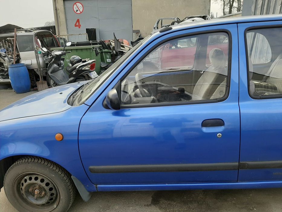 Nissan Micra K11 5D 1.0i 1995r.Drzwi przednie lewe.