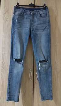 Spodnie dżinsowe jeansowe dżinsy jeansy damskie HM r. 38 z dziurami